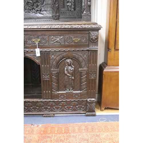 180 - A late 19th century Flemish carved oak sideboard with raised panelled back, width 150, depth 60, hei... 