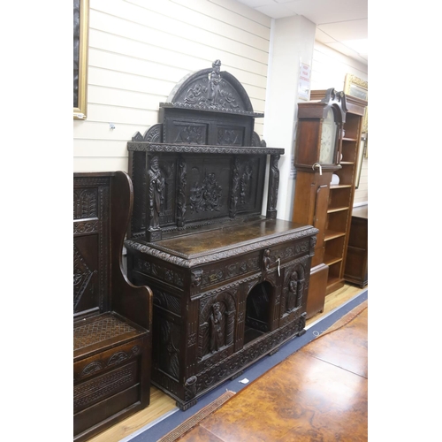 180 - A late 19th century Flemish carved oak sideboard with raised panelled back, width 150, depth 60, hei... 