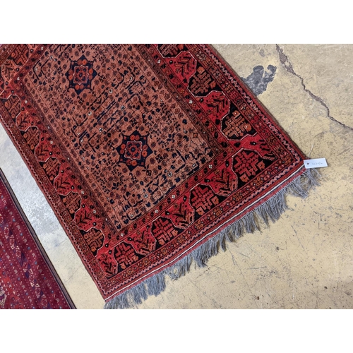 2 - A Belouch red ground rug, 148 x 106cm