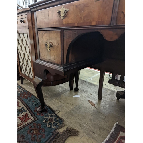 22 - A Queen Anne revival banded walnut kneehole dressing table, width 102cm, depth 48cm, height 75cm... 