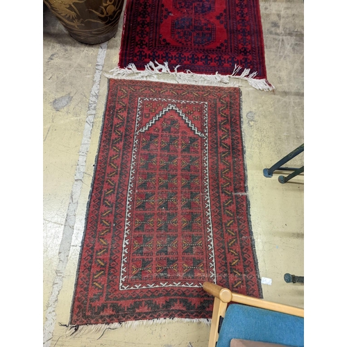 24 - Three Bokhara rugs, largest 134 x 99cm