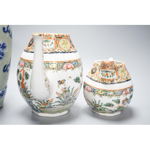 251 - A Chinese celadon glazed vase, 24cm and a Chinese famille rose teapot and matching cream jug, a.f.... 