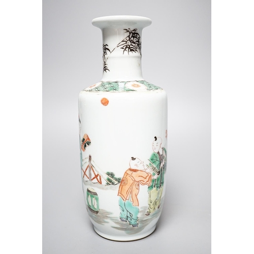 256 - A Chinese famille verte rouleau  vase, painted with figures in a garden, 22cm