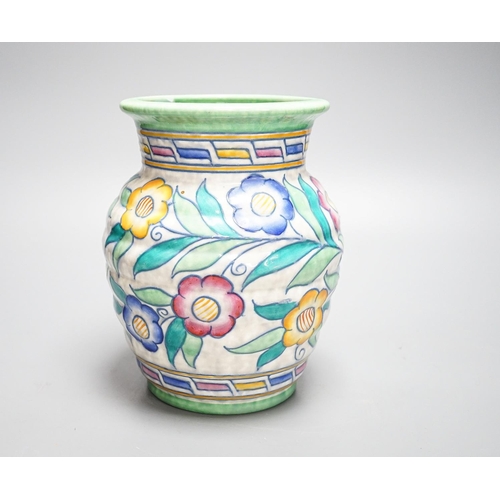 259 - A Charlotte Rhead vase, painted with flowers in polychrome enamels, 20cm