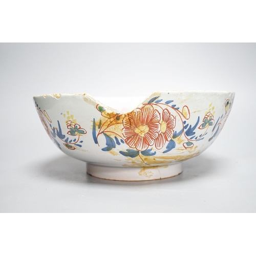 261 - An 18th century English polychrome delftware bowl, interior inscribed "Success to The British A... 