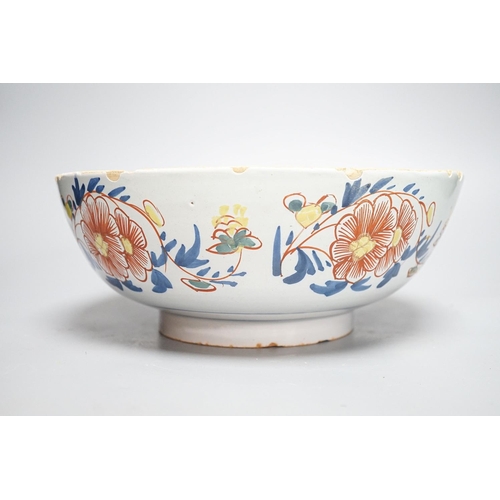 261 - An 18th century English polychrome delftware bowl, interior inscribed "Success to The British A... 