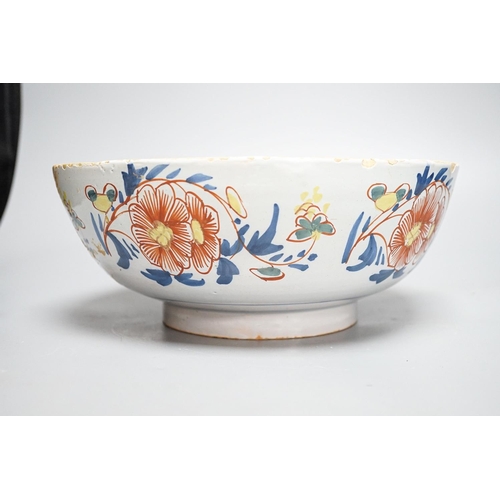 261 - An 18th century English polychrome delftware bowl, interior inscribed "Success to The British A... 