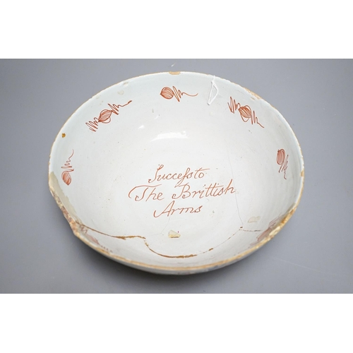 261 - An 18th century English polychrome delftware bowl, interior inscribed "Success to The British A... 