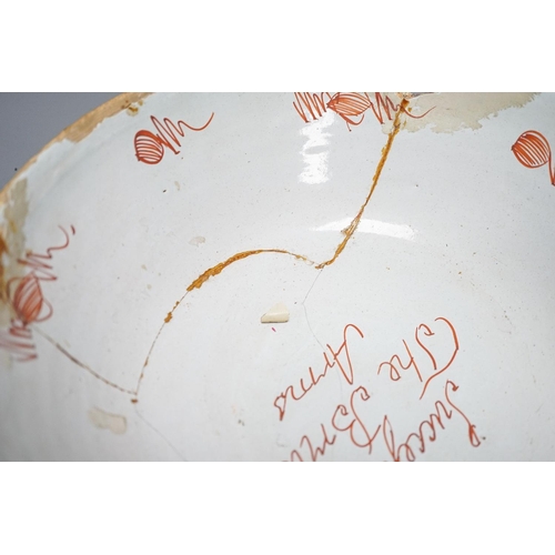 261 - An 18th century English polychrome delftware bowl, interior inscribed "Success to The British A... 