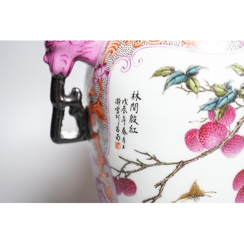 262 - A Chinese porcelain famille rose two handled vase, Hongxian mark, 30cm