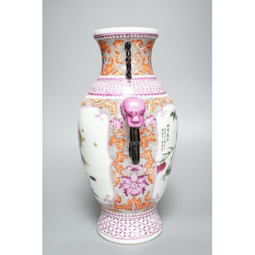 262 - A Chinese porcelain famille rose two handled vase, Hongxian mark, 30cm