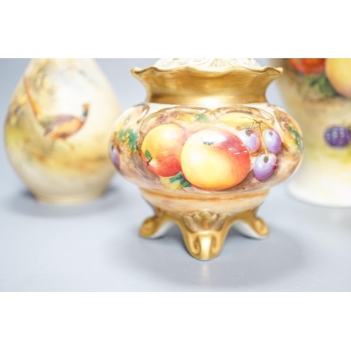 263 - A Royal Worcester fruit painted small pot pourri and cover, 10.9cm high and a similar vase, 15cm, a ... 