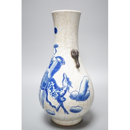 267 - A Chinese crackle glaze porcelain two handled vase, painted in underglaze blue, seal mark, 27cm... 