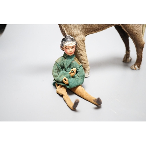 268 - Two Edith Reynolds handmade real skin and leather horse models, 18cm high, together with a female jo... 