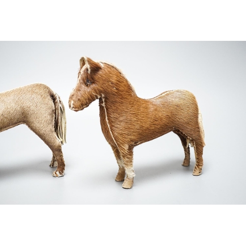 268 - Two Edith Reynolds handmade real skin and leather horse models, 18cm high, together with a female jo... 