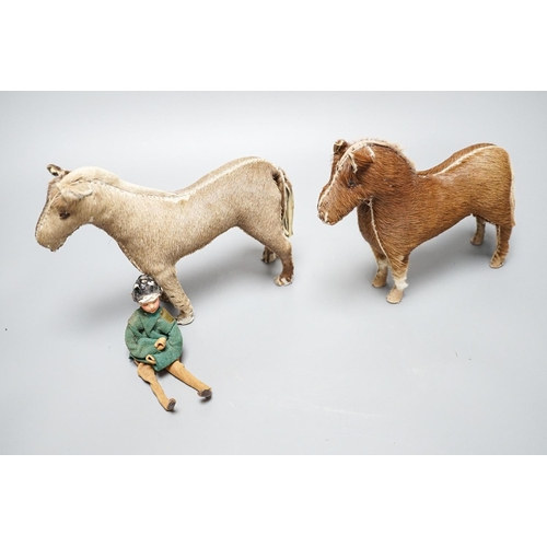 268 - Two Edith Reynolds handmade real skin and leather horse models, 18cm high, together with a female jo... 