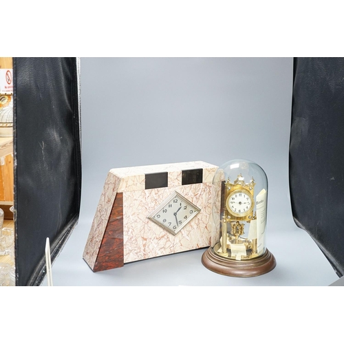 273 - An Art Deco rouge marble mantel timepiece, 45cm wide, quartz movement replacement and a brass annive... 