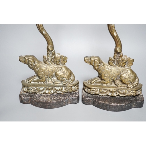 275 - Two matching Victorian cast brass spaniel door stops.