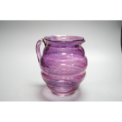 278 - An amethyst flashed glass basin and jug.