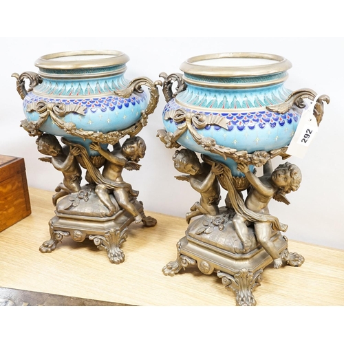 292 - A pair of large ormolu mounted earthenware vases 39cm