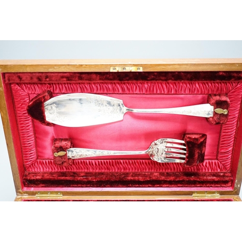 296 - A cased set of plated engraved fish cutlery