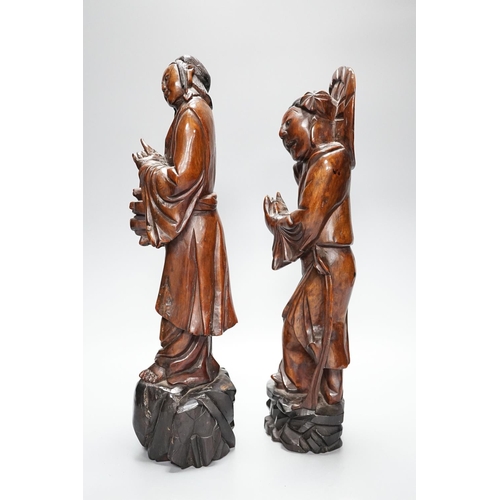 298 - Two early 20th century Chinese carved hardwood figures of ladies 39cm