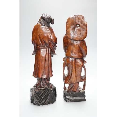 298 - Two early 20th century Chinese carved hardwood figures of ladies 39cm