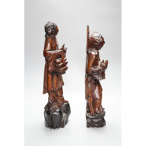 298 - Two early 20th century Chinese carved hardwood figures of ladies 39cm