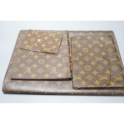 304 - Five Pieces of Louis Vuitton to including a toilet bag, and two soft cases.