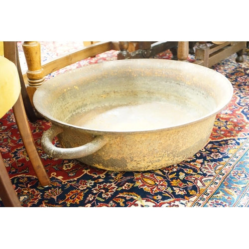 31 - A large cast iron French circular preserve pan, diameter 82cm, height 26cm