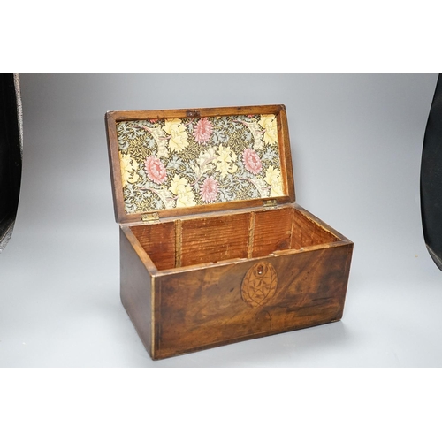 311 - A George III inlaid mahogany tea caddy, lacking interior, 28cm