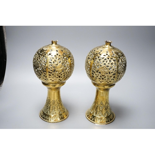 317 - A pair of Indian brass incense burners, each of pomegranate form, 28cm