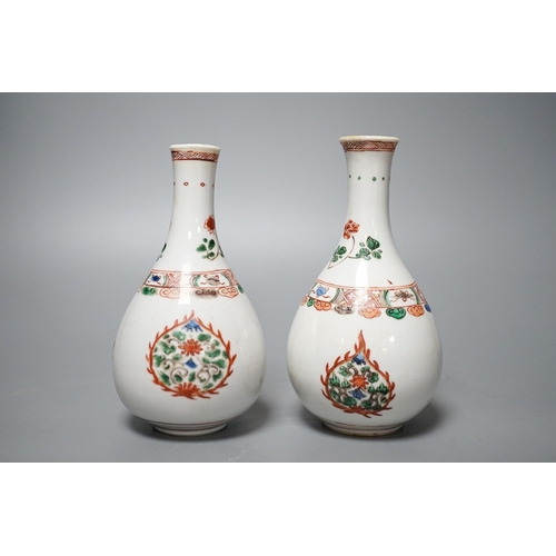 321 - Two Chinese famille verte bottle vases, Kangxi period. 17cm