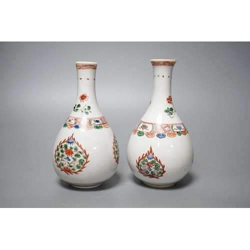 321 - Two Chinese famille verte bottle vases, Kangxi period. 17cm