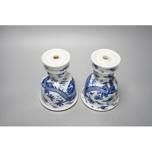 338 - A pair of Chinese blue and white joss stick holders 14.5cm