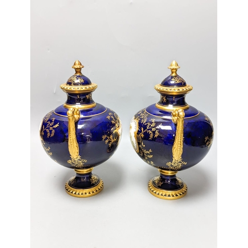 356 - A pair of Coalport bird painted vases and covers, c.1900, inscribed  Y.5146 - 22cm