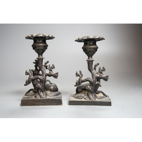 358 - A pair of 19th century bronze stag and doe dwarf candlesticks 14cm