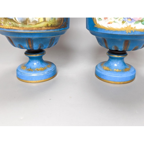 361 - A pair of Sevres style porcelain bleu celeste ground vases and covers, 34cm