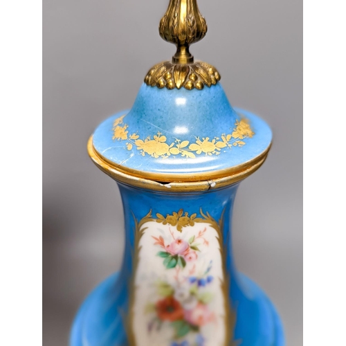 361 - A pair of Sevres style porcelain bleu celeste ground vases and covers, 34cm