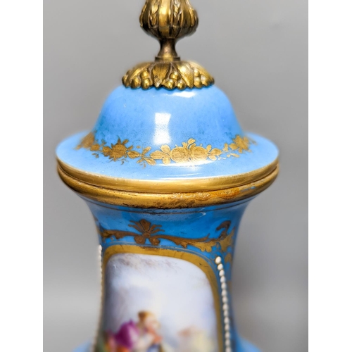 361 - A pair of Sevres style porcelain bleu celeste ground vases and covers, 34cm