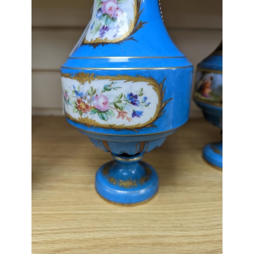 361 - A pair of Sevres style porcelain bleu celeste ground vases and covers, 34cm