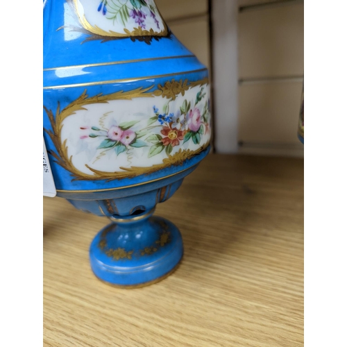 361 - A pair of Sevres style porcelain bleu celeste ground vases and covers, 34cm