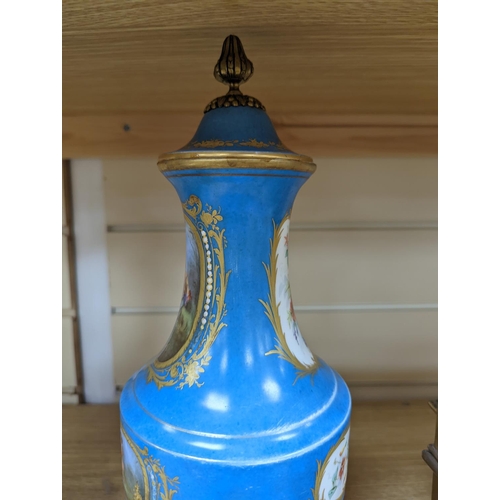 361 - A pair of Sevres style porcelain bleu celeste ground vases and covers, 34cm