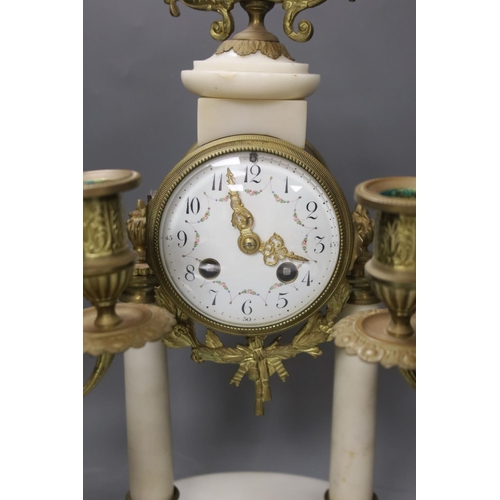 372 - A French ormolu and alabaster clock garniture, c.1900. Pendulum, no key. 40cm