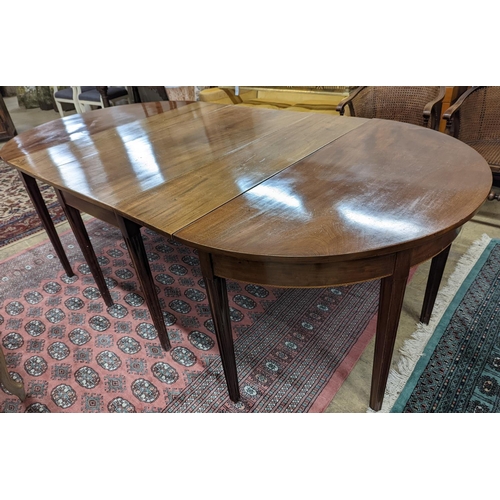 38 - A George III mahogany D end extending dining table, with drop flap central section, length 240cm ext... 