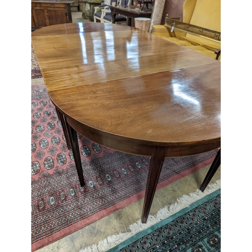 38 - A George III mahogany D end extending dining table, with drop flap central section, length 240cm ext... 