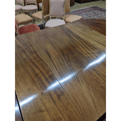 38 - A George III mahogany D end extending dining table, with drop flap central section, length 240cm ext... 