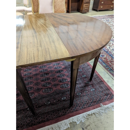 38 - A George III mahogany D end extending dining table, with drop flap central section, length 240cm ext... 