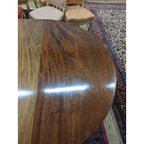 38 - A George III mahogany D end extending dining table, with drop flap central section, length 240cm ext... 