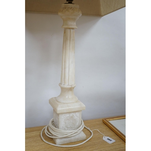 390 - An alabaster desk lamp with shade